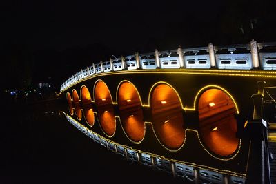 Illuminated cars at night