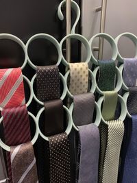 Close-up of colorful neckties hanging on coathanger