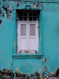 Closed window of old building