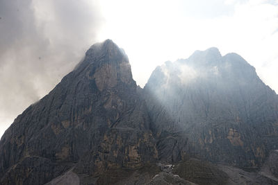 Scenic view of rocky mountains against sky