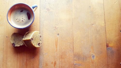 High angle view of coffee cup on table