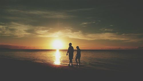 Scenic view of sea at sunset