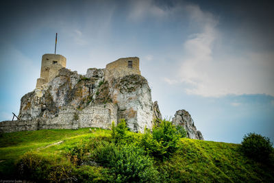 Low angle view of old building against sky