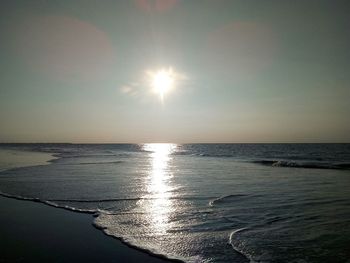 Scenic view of sea against sky at sunset