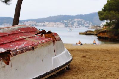 Upside down boat at beach