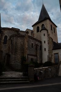 Low angle view of old building against sky