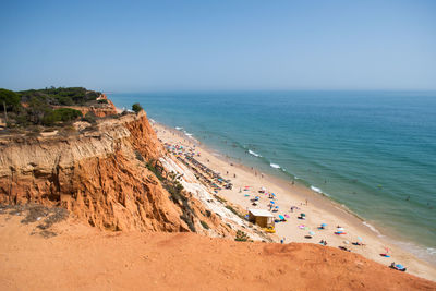 Scenic view of beach against clear sky