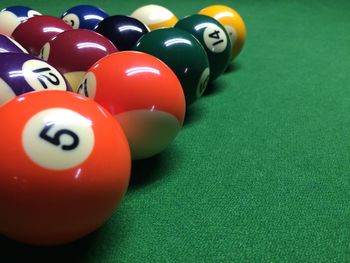 Close-up of colorful balls on pool table