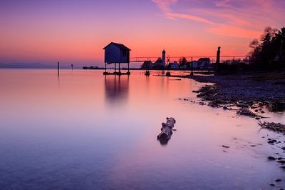 Scenic view of sea against sky at sunset