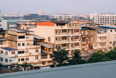 High angle view of residential buildings against sky