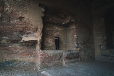 Full length of man standing in abandoned building