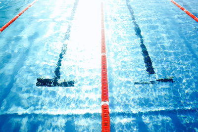 Full frame shot of swimming pool with lane markers