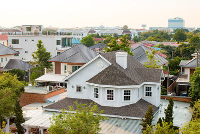 High angle view of houses against sky