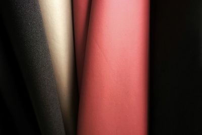 Close-up of rolled up fabrics