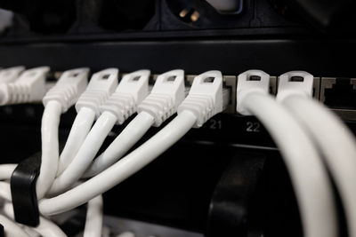 Close-up of computer cables connected to router