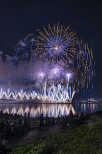 Firework display at night