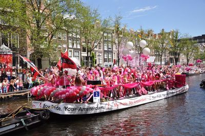 Group of people on boat in river