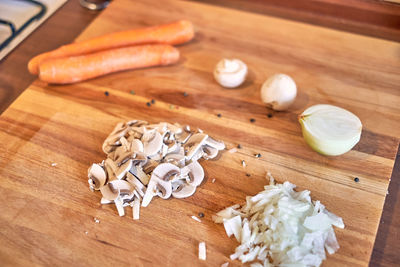 High angle view of chopped bread on cutting board