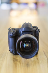 Close-up of camera on table