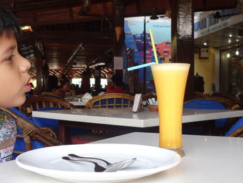 Close-up of drink on table at cafe