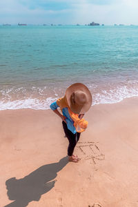 Full length of women on beach