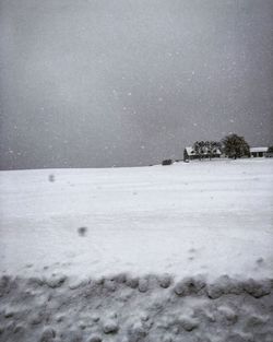 Scenic view of snow field against sky