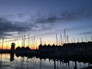 View of harbor at sunset