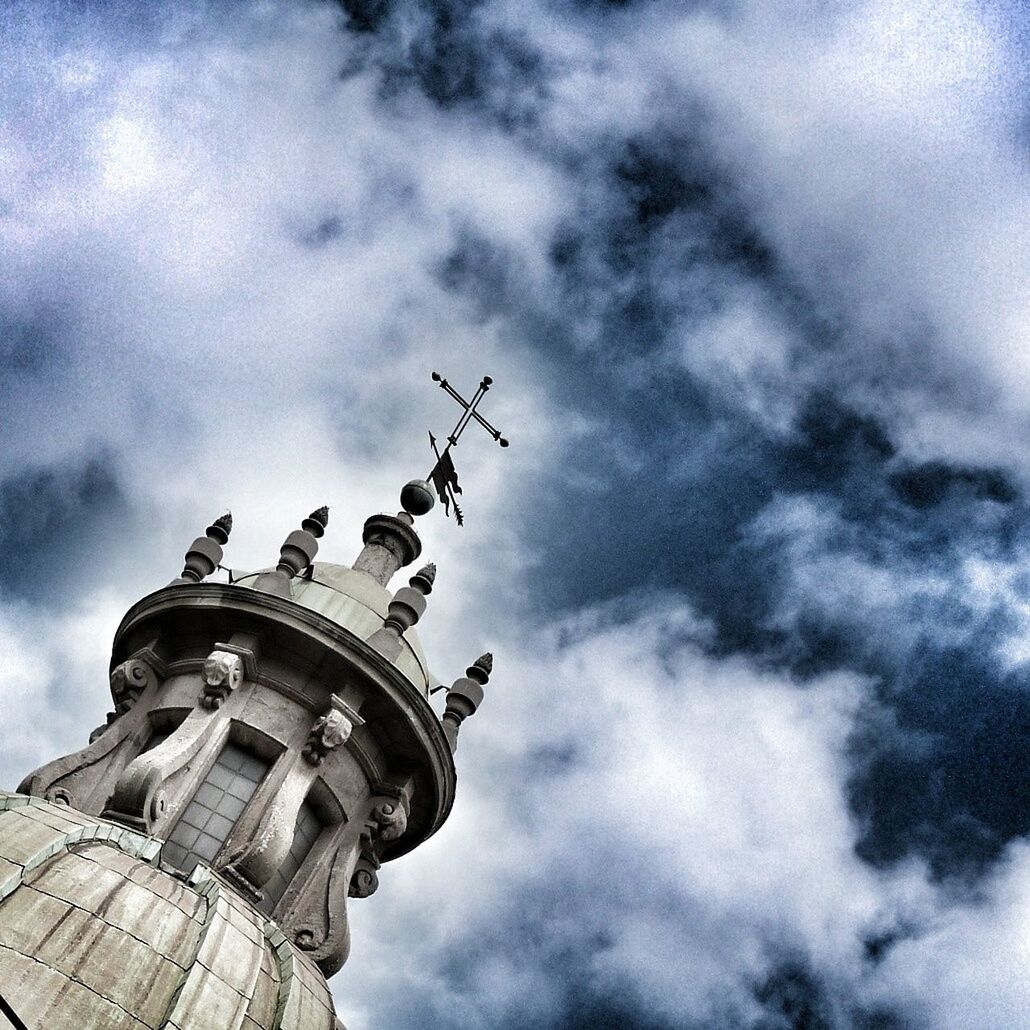 low angle view, architecture, sky, built structure, famous place, cloud - sky, building exterior, travel destinations, history, travel, tourism, cloudy, international landmark, religion, place of worship, capital cities, statue, sculpture, spirituality