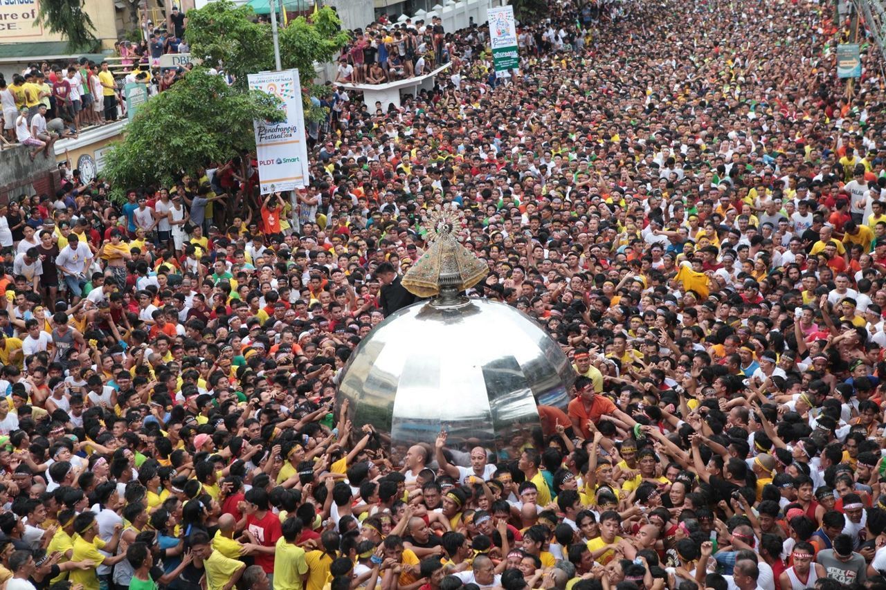 HIGH ANGLE VIEW OF PEOPLE IN TRADITIONAL CLOTHING