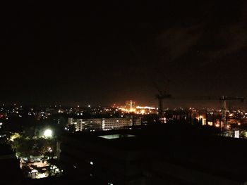 Illuminated cityscape at night