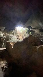 Aerial view of illuminated snow covered landscape at night