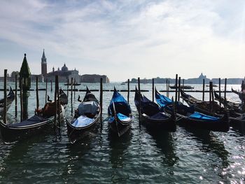 View of boats moored in water