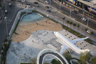 Aerial view of airplane sculpture in city