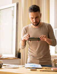 Young man working at home