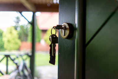 Close-up of key on door