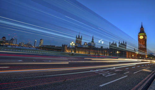 Light trails on london street at night