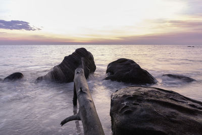 Scenic view of sea against sky during sunset