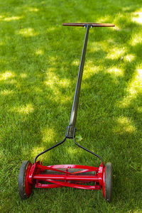 A full view of a reel lawnmower after the restoration process was completed