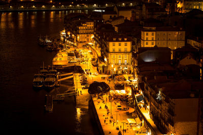 High angle view of illuminated cityscape at night