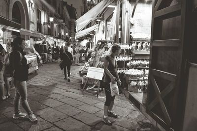 People walking on street in city