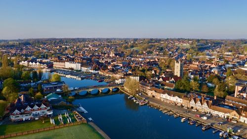 High angle view of river amidst buildings in city