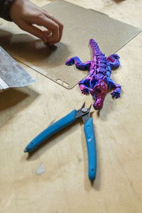 Cropped hand of woman with iv drip