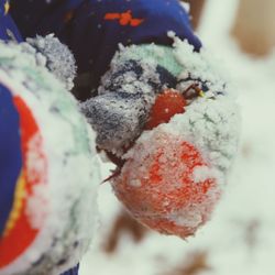 Hand of a child in winter