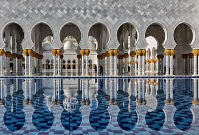 Reflection of building on swimming pool