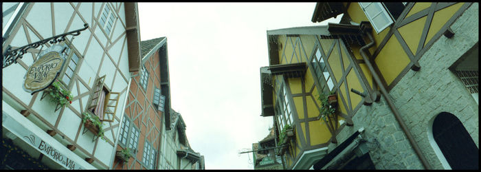 Low angle view of buildings against clear sky