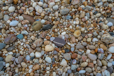 Full frame shot of pebbles on beach