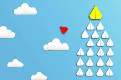 White umbrella against blue sky