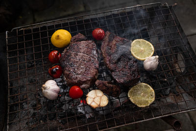 High angle view of fruits on barbecue