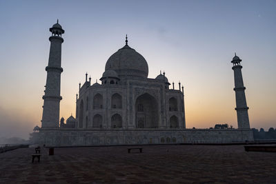 Low angle view of mosque against clear sky