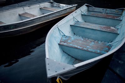 High angle view of boats moored at harbor